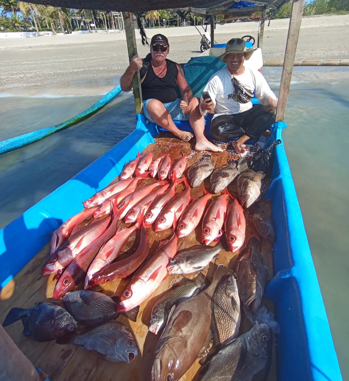 A full boat of red snapper and reef fish landed off Kuta, Bali